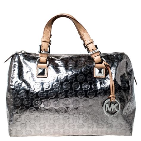 silver michael kors bag with pockets|Michael Kors medium black silver.